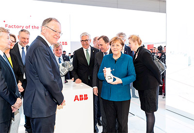 ABB shows the factory of the future to German Chancellor and PM of Sweden